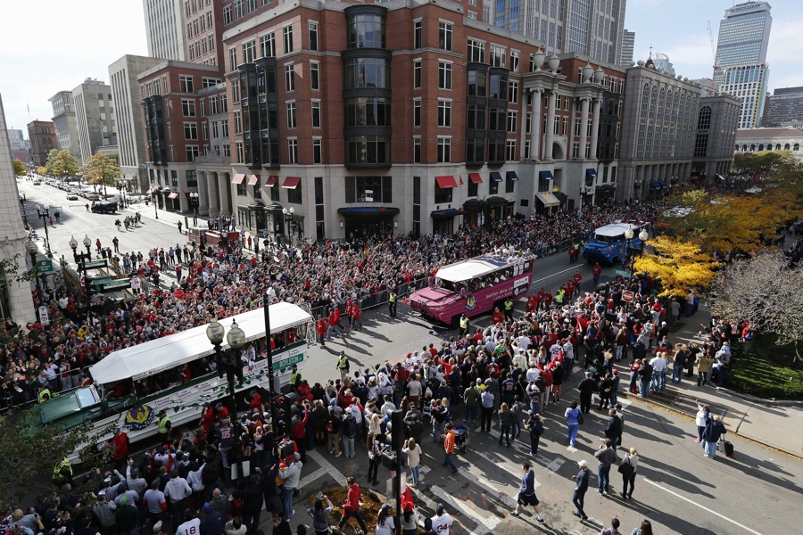 Red Sox players parade through Boston streets after World Series